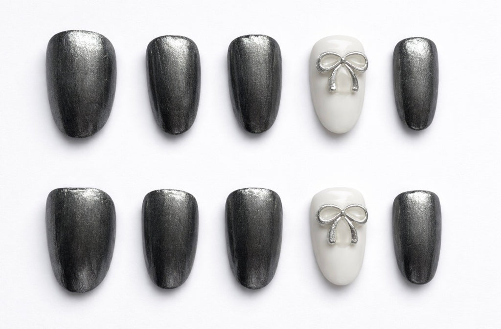 Glossy Silver and white Handcrafted Press-On Nails with silver bow decoration