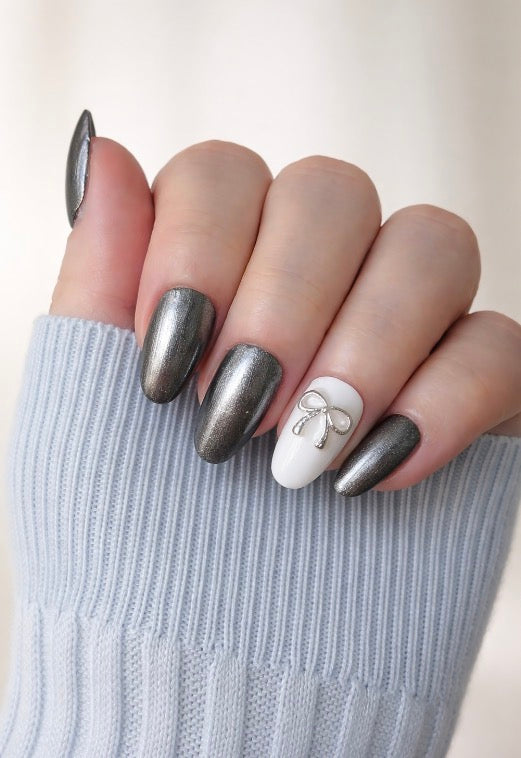 Glossy Silver and white Handcrafted Press-On Nails with silver bow decoration
